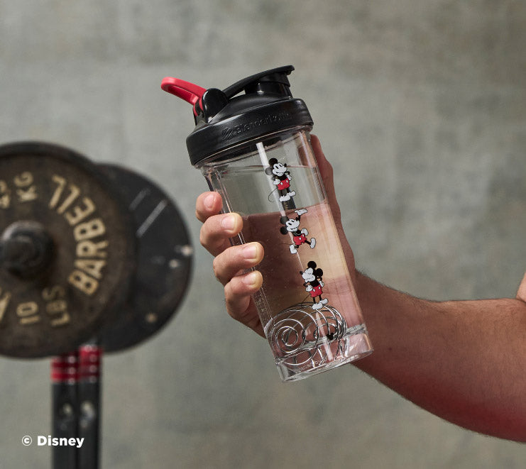 pro-series-p2 Mickey_Mouse_Protein_Shaker_Bottle_Being_Held_In_the_Gym.jpg